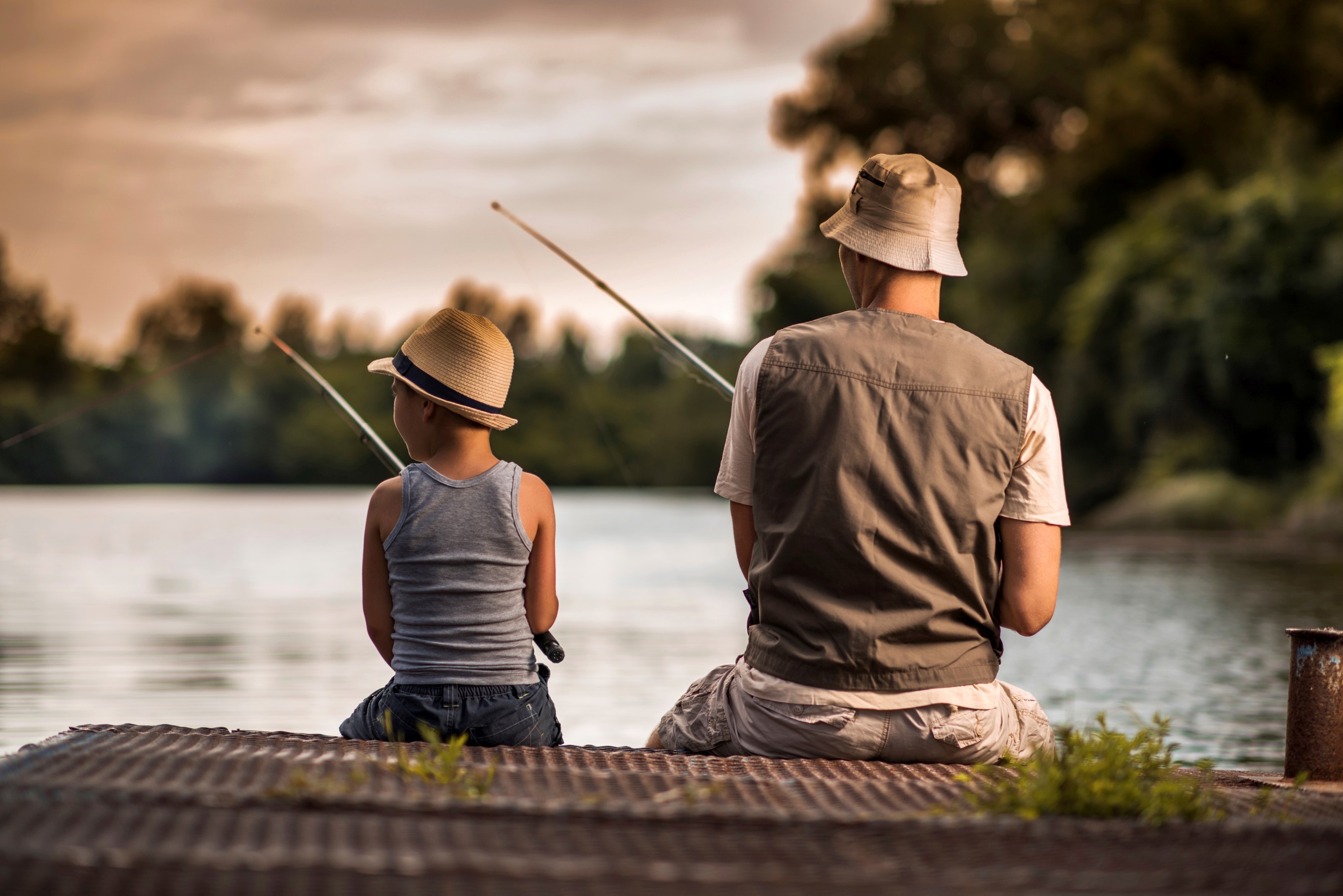 Father & Son Fishing on dock